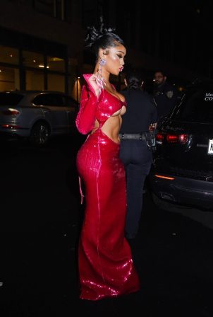 Saweetie - Arrives at the La Quan Smith fashion show in a chic red dress in New York