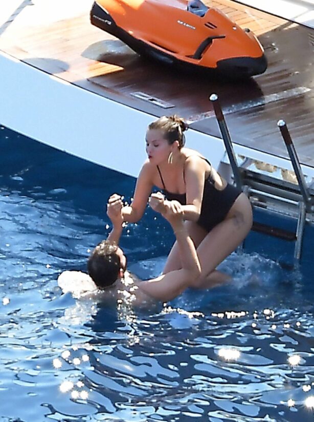 Selena Gomez - In a swimsuit on a yacht during her birthday vacation in Positano