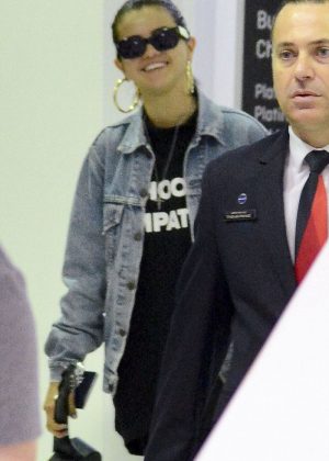 Selena Gomez in Jeans Jacket at Airport in Sydney