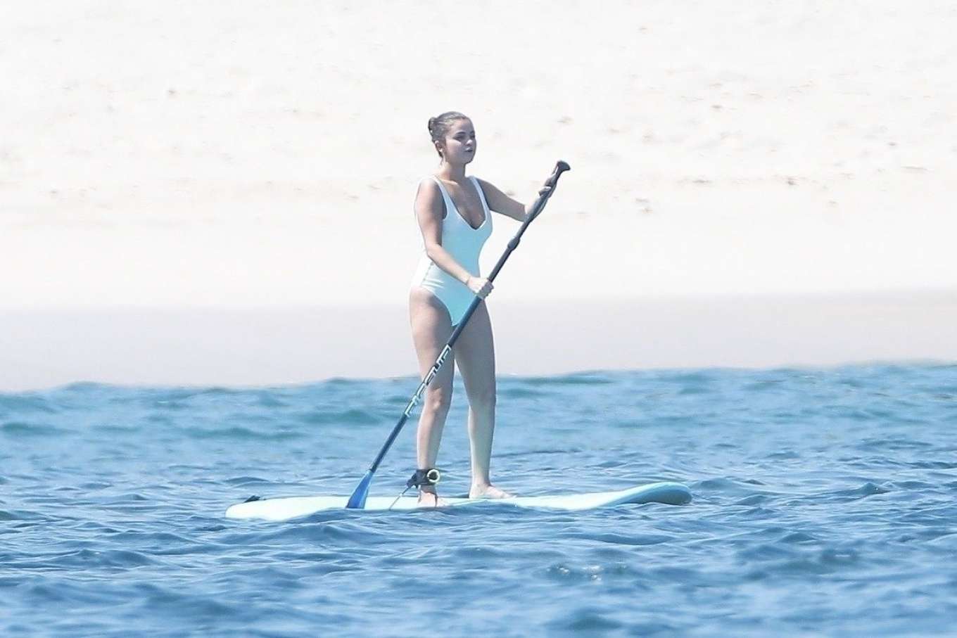 Selena Gomez 2019 : Selena Gomez in White Swimsuit Paddleboarding-01