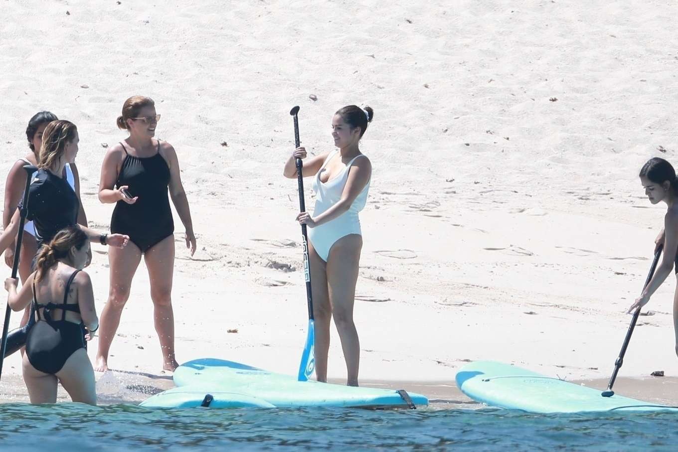 Selena Gomez 2019 : Selena Gomez in White Swimsuit Paddleboarding-09