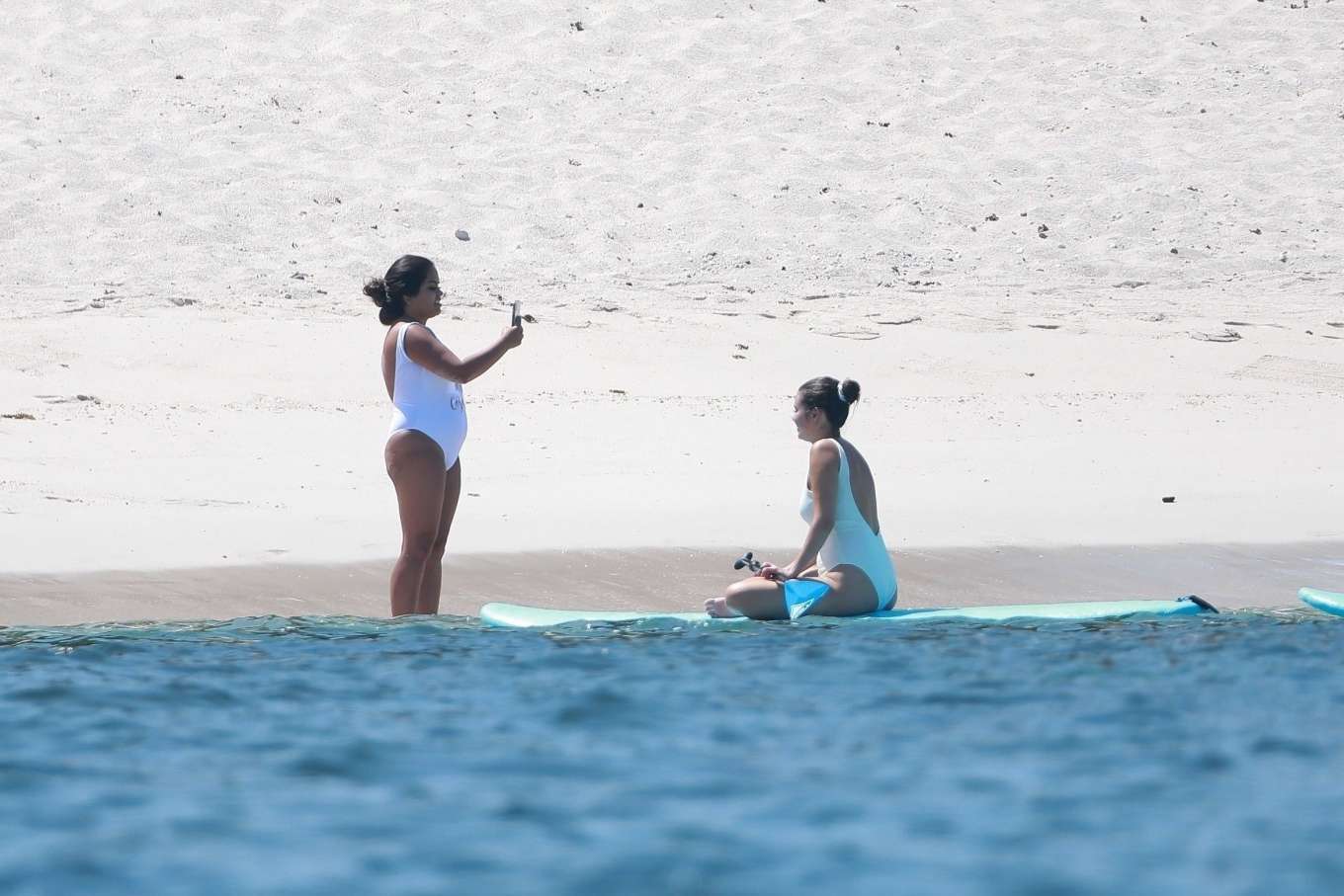 Selena Gomez 2019 : Selena Gomez in White Swimsuit Paddleboarding-19
