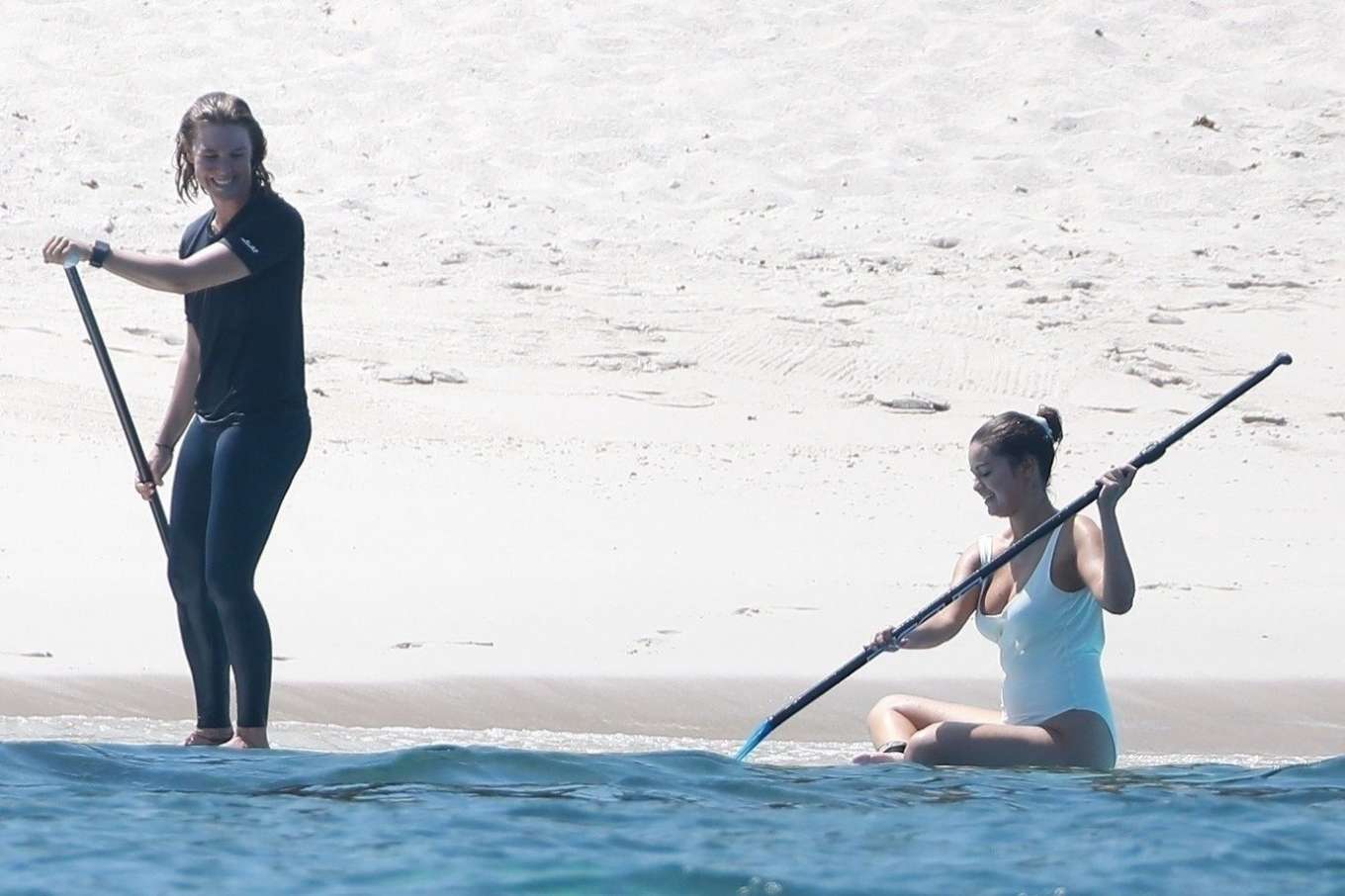Selena Gomez 2019 : Selena Gomez in White Swimsuit Paddleboarding-24
