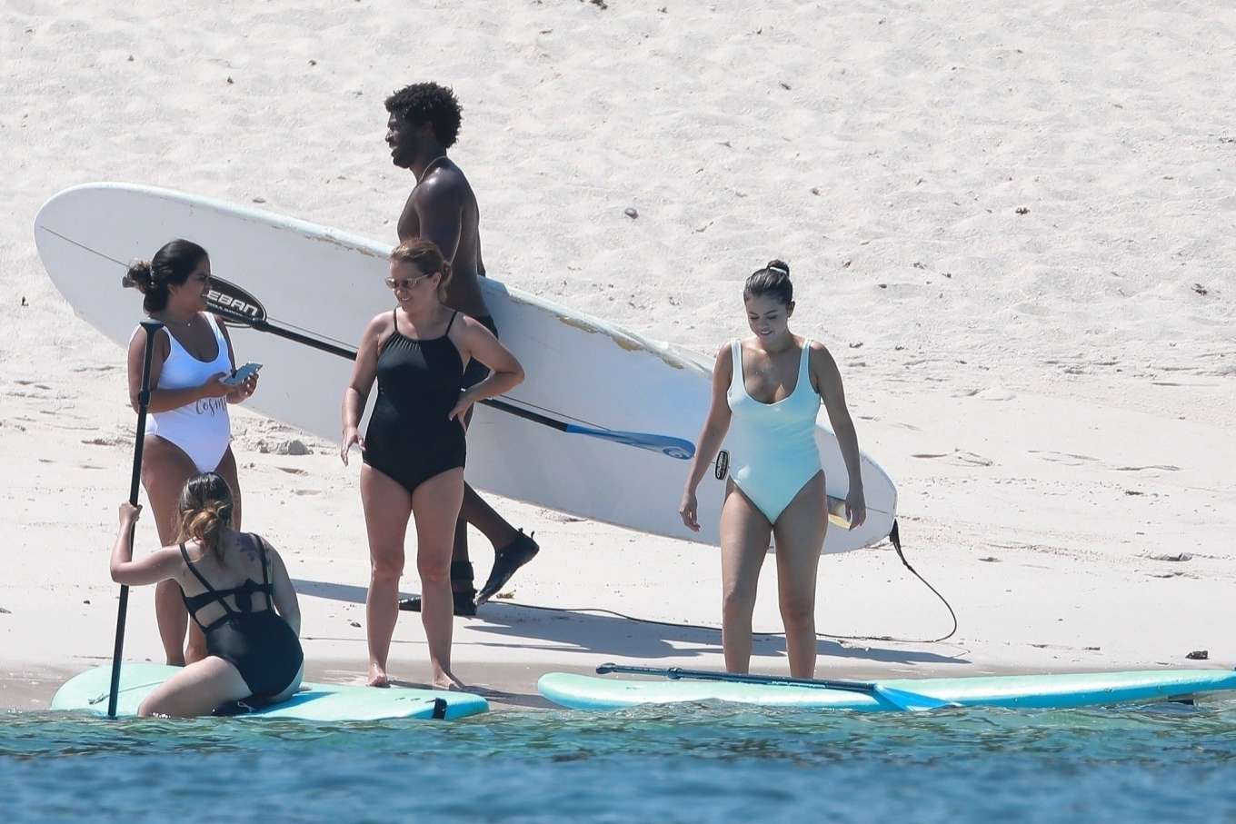 Selena Gomez 2019 : Selena Gomez in White Swimsuit Paddleboarding-32