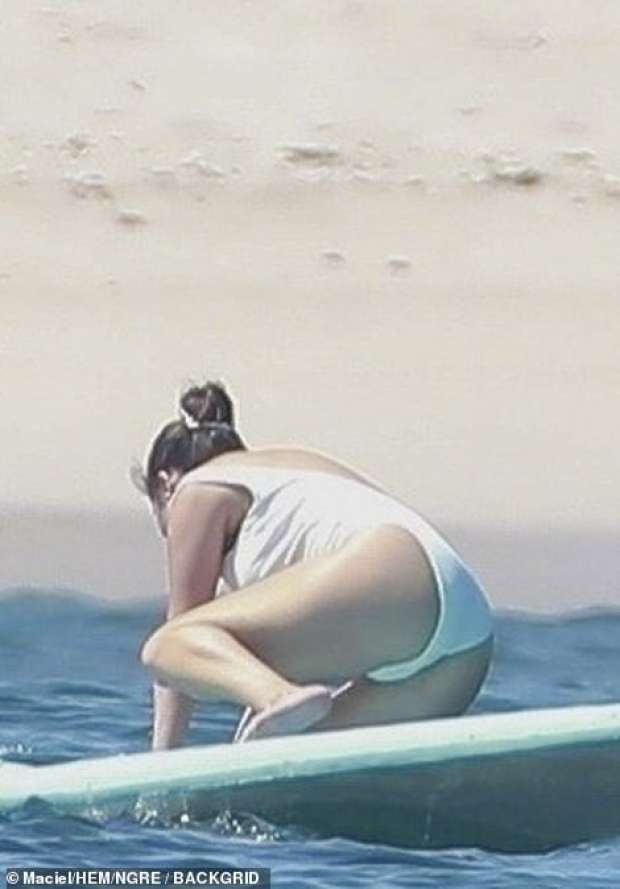 Selena Gomez - Wear White Swimsuit at a Beach in Punta Mita - Mexico. 