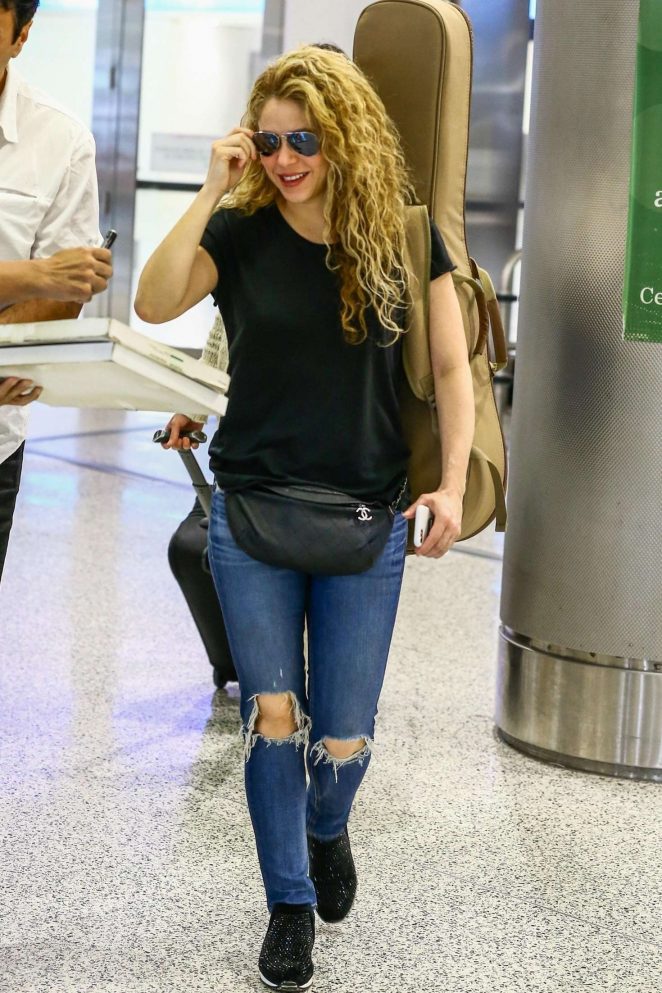 Shakira in Ripped Jeans at Airport in Miami -11 | GotCeleb