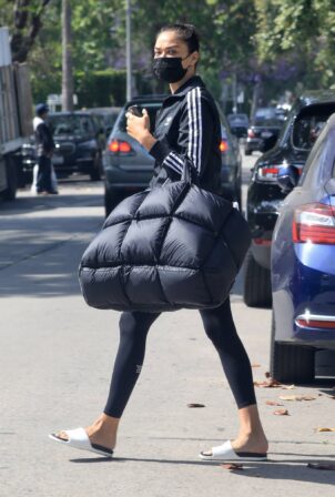 Shanina Shaik - Brings an oversized quilted puffy tote to the gym in West Hollywood