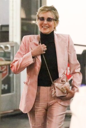 Sharon Stone - In a pink pantsuit shopping at Rodeo Drive in Beverly Hills