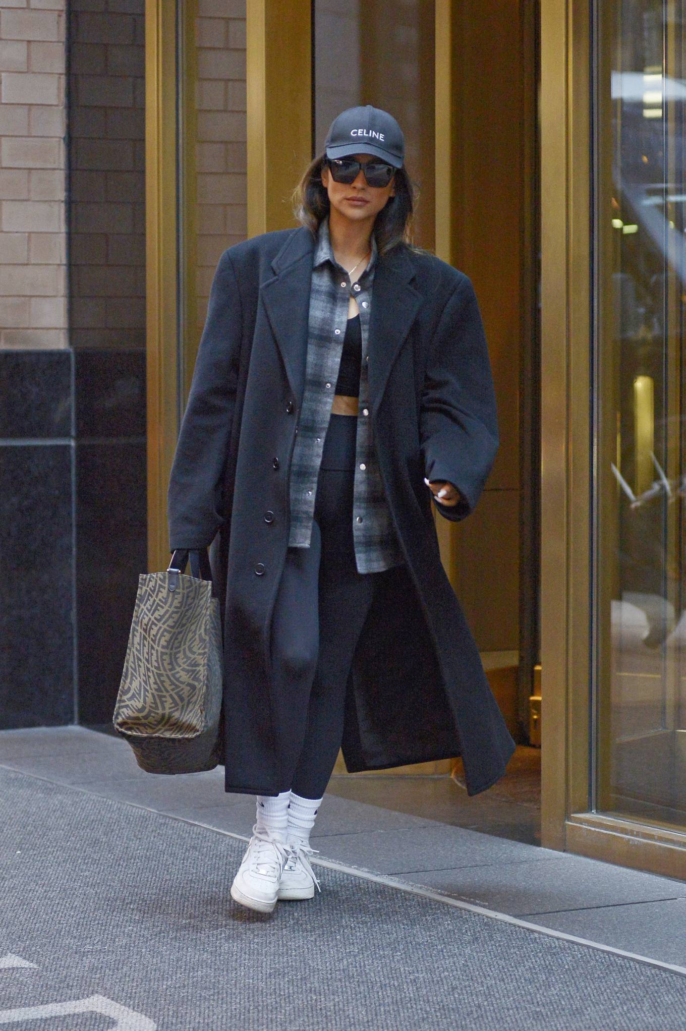 Shay Mitchell - Heading out of her hotel in New York