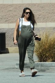 Shay Mitchell - Shows off her baby bump at Best Buy in LA