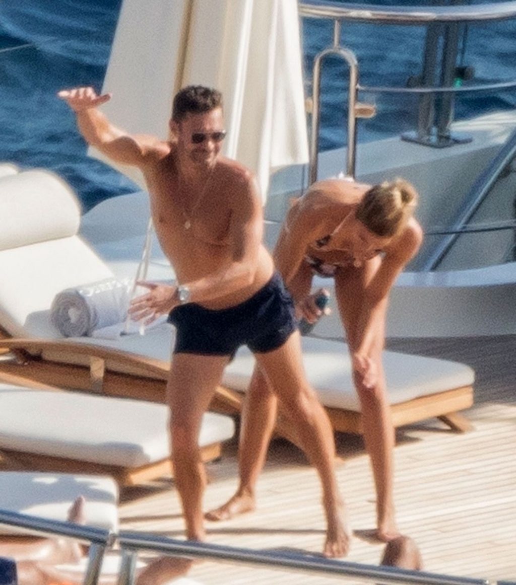 Shayna Taylor and Ryan Seacrest - In bikini on a yacht in Positano. 