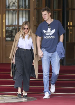 Sienna Miller and boyfriend Lucas Zwirner - Leave their hotel in Paris
