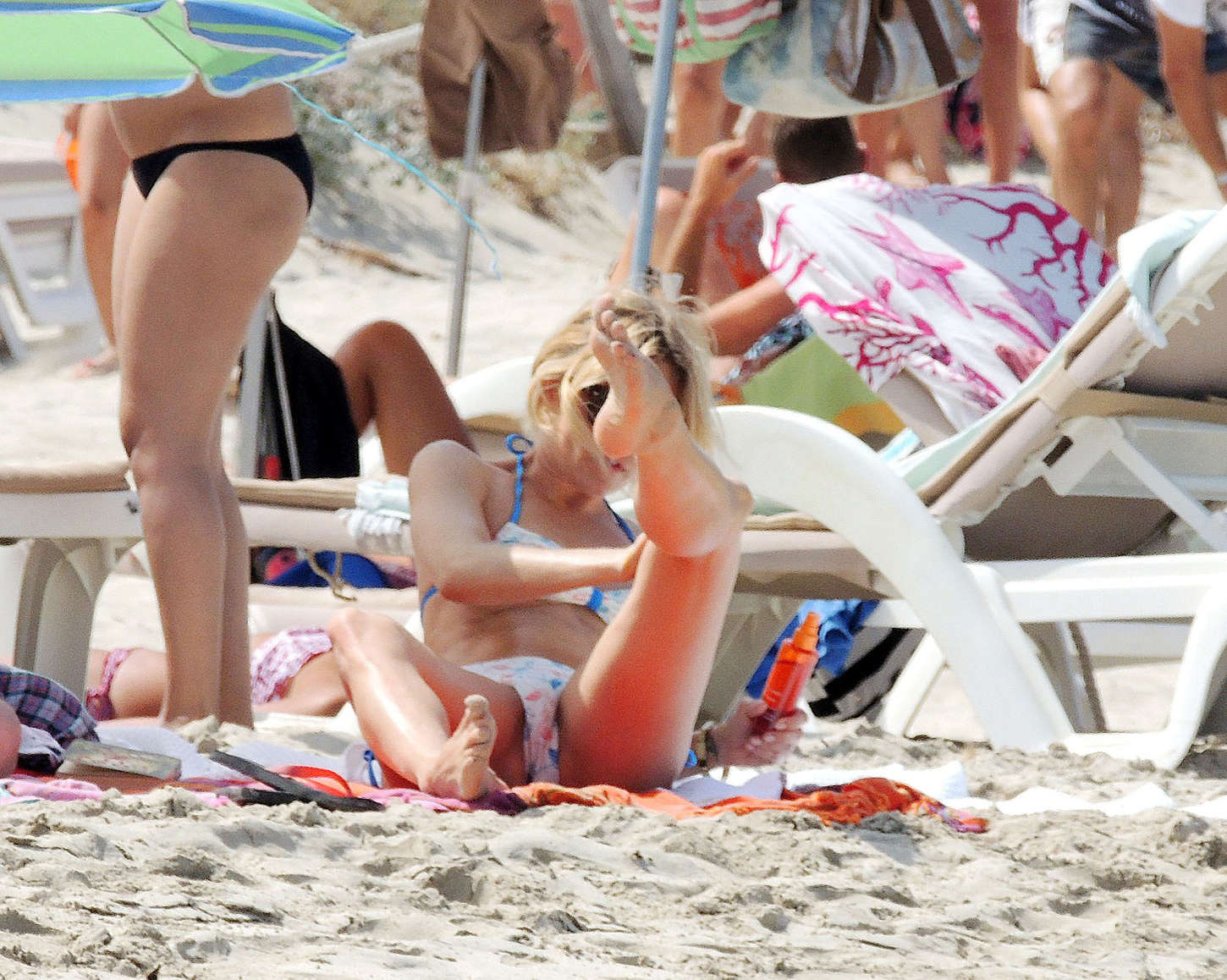 Sienna Miller - Bikini Candids in Spain. 
