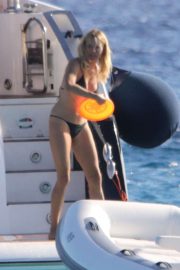 Sienna Miller - In bikini on a boat in Formentera in Spain