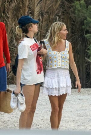 Sienna Miller - With Cara Delevingne on vacation in Ibiza