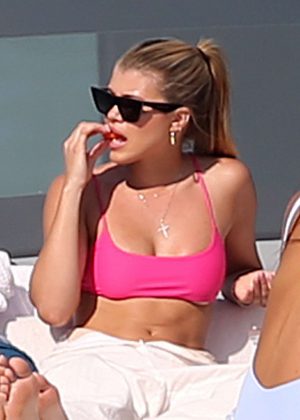 Sofia Richie in Pink Bikini Top on a yacht in Miami