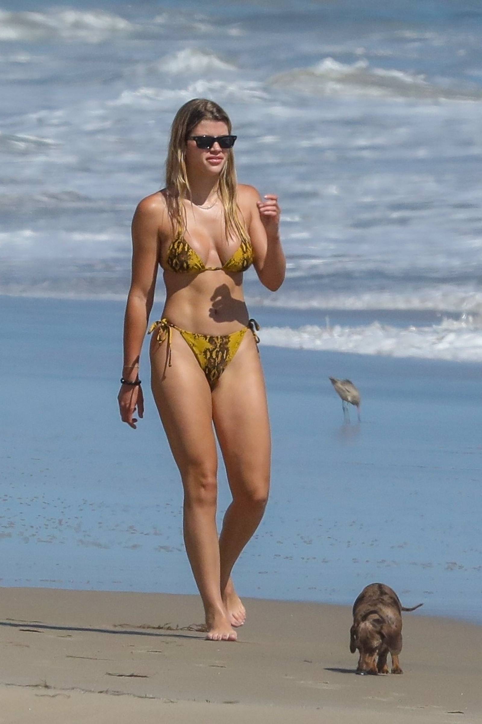 Sofia Richie â€“ In Yellow bikini on a beach in Malibu