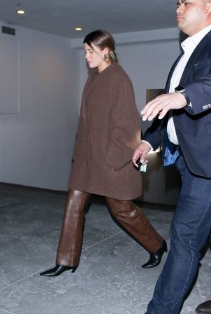 Sofia Richie - Wearing a large coat to dinner with friends in Beverly Hills