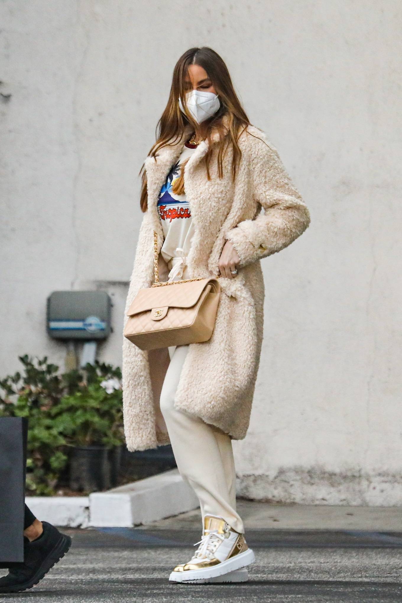 Sofia Vergara - Wears a beige shearling coat while out shopping in Beverly Hills