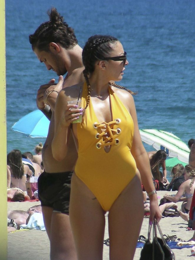 Sophie Gradon in Yellow Swimsuit on the beach in Barcelona