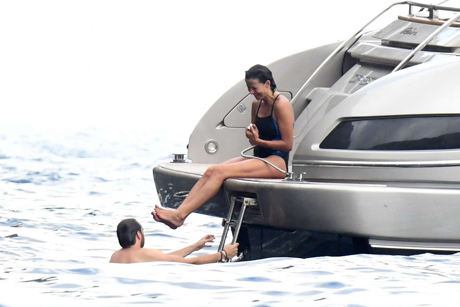 Sophie Marceau in Bikini on a yacht in Capri. 