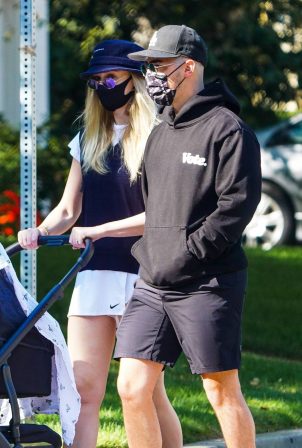 Sophie Turner and Joe Jonas - Out for a walk with their new baby Willa in Los Angeles