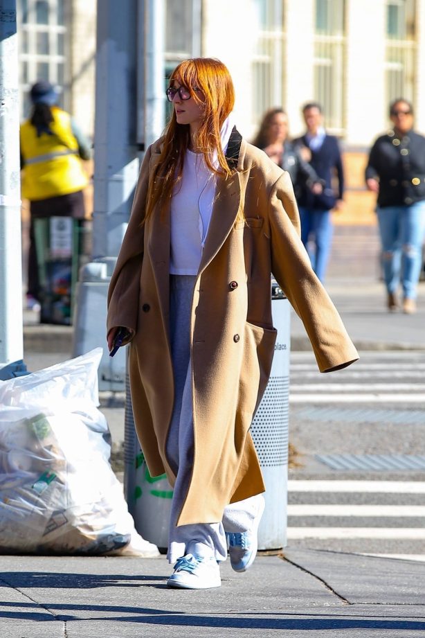 Sophie Turner - In a long over coat while out in New York