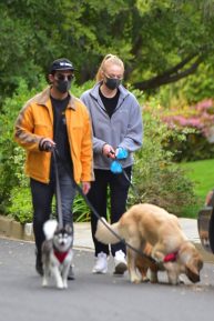 Sophie Turner - Take her dogs out for a walk in Los Angeles