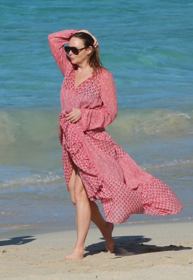 Stella McCartney in long dress on the beach in St Barth