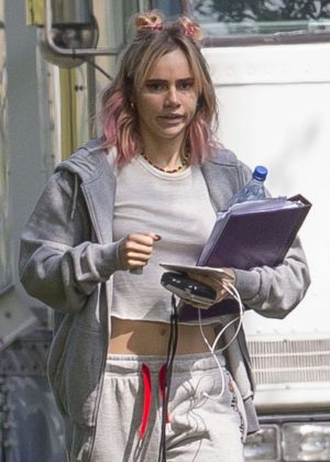 Suki Waterhouse in a crop top out in New Orleans