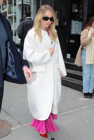 Sydney Sweeney - In a white coat and pink dress as she leaves a Bai event in New York