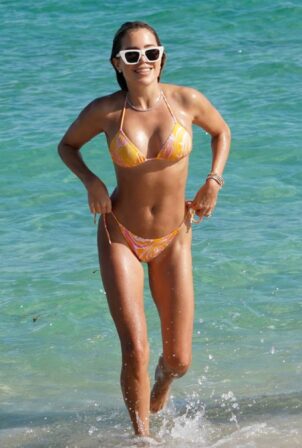 Sylvie Meis - In a orange bikini at the beach in Miami