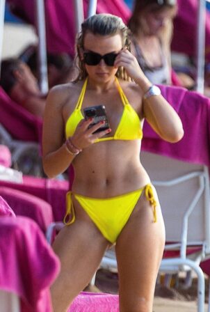 Tallia Storm - In a yellow bikini at Sandy Lane Hotel’s beach in Barbados