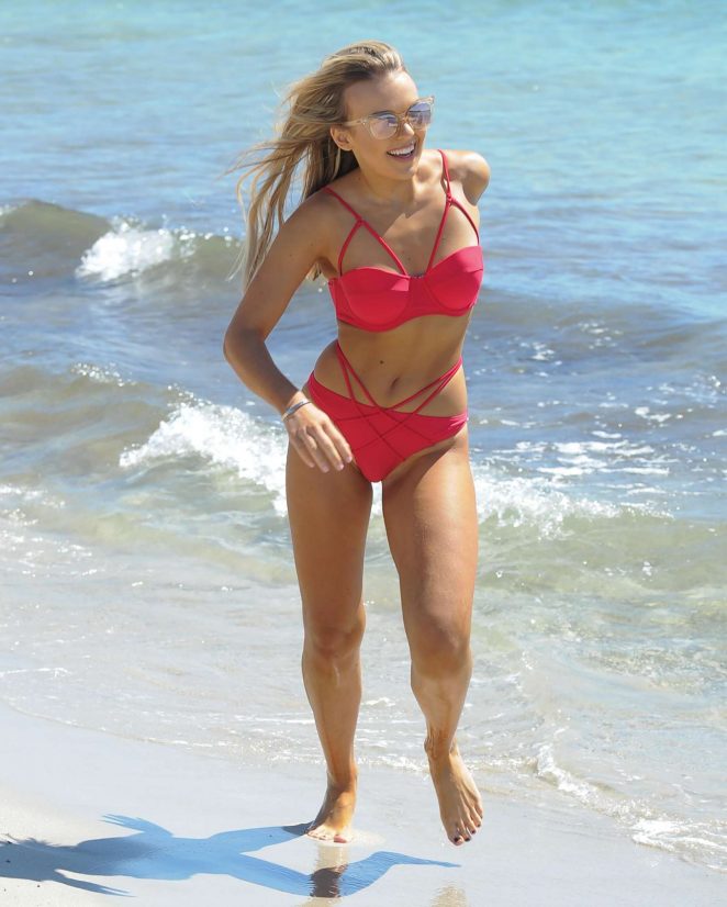 Tallia Storm in Red Bikini on the beach in Cap Verde