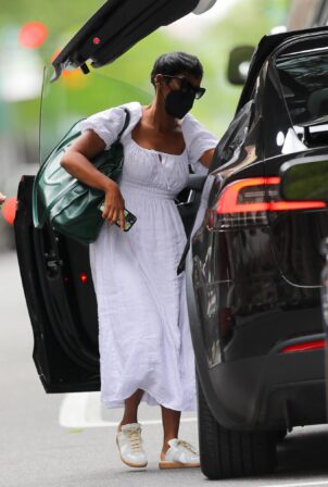 Tamron Hall - In a white dress laves work in New York