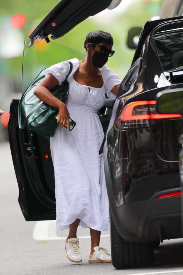 Tamron Hall - In a white dress laves work in New York