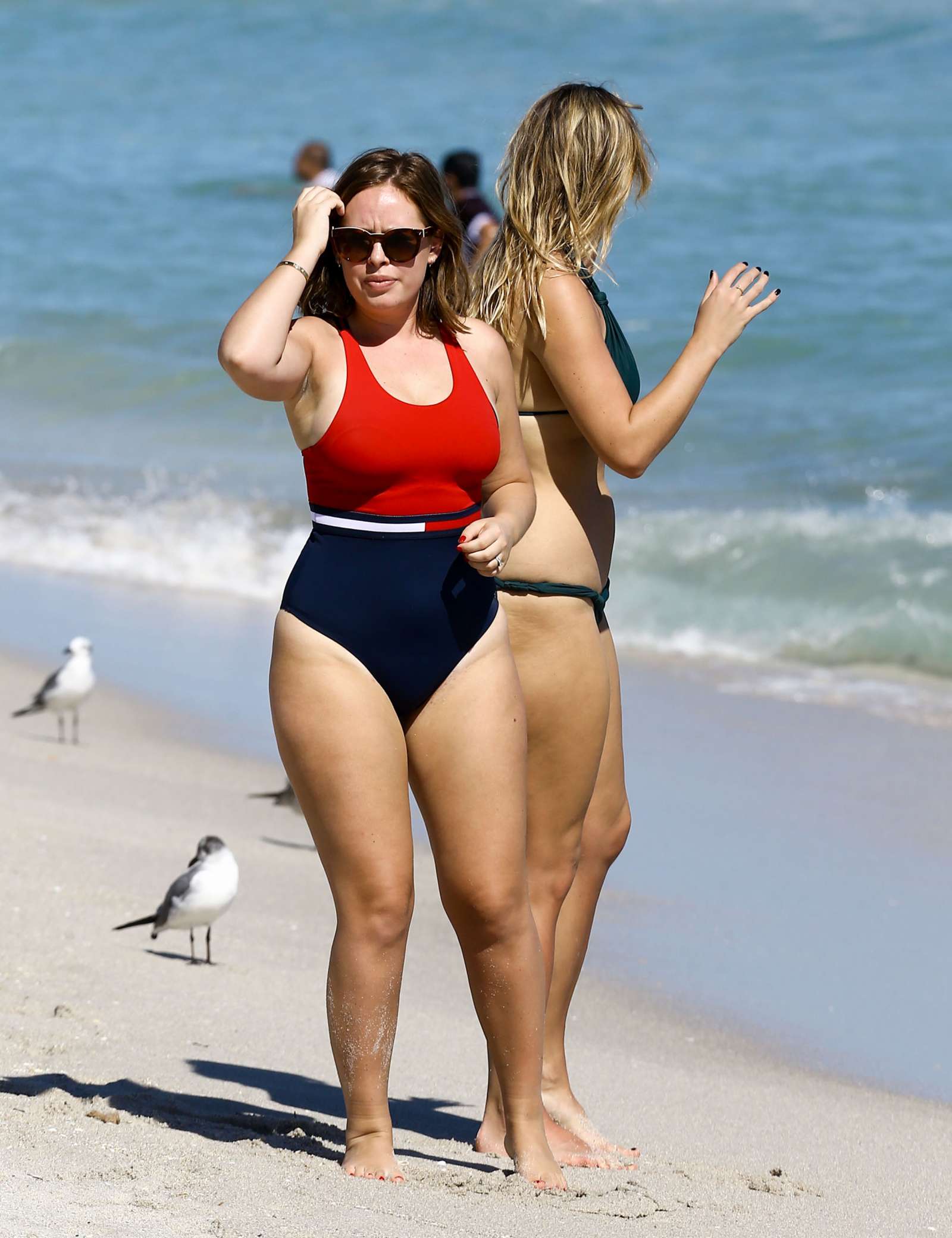 Tanya Burr in Swimsuit on the beach in Miami. 