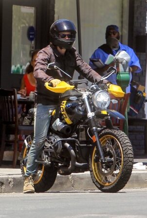 Taylor Kitsch - out on his motorbike