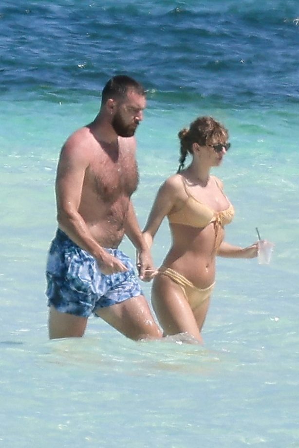 Taylor Swift - In a bikini With Travis Kelce seen at a beach getaway together