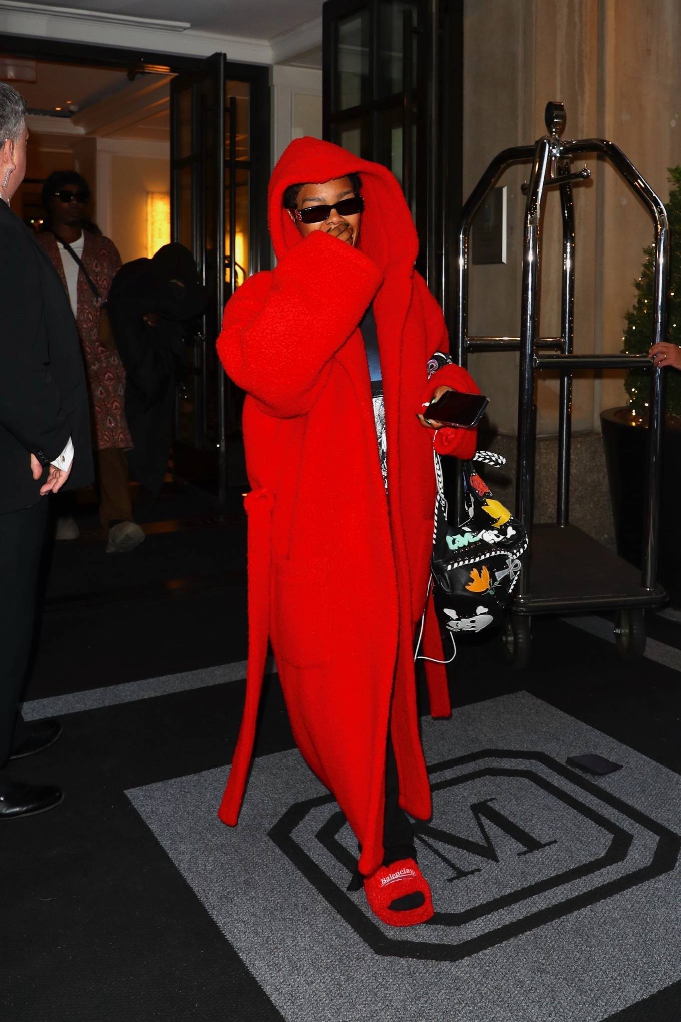 Teyana Taylor - In a huge red Balenciaga robe at the Mark hotel in New York