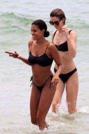 Tina Kunakey in Black Bikini on the beach in Rio de Janeiro