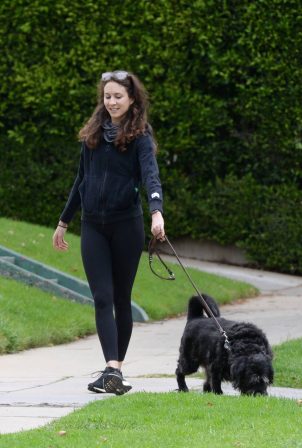 Troian Bellisario - Out for a walk with her dog in Los Angeles