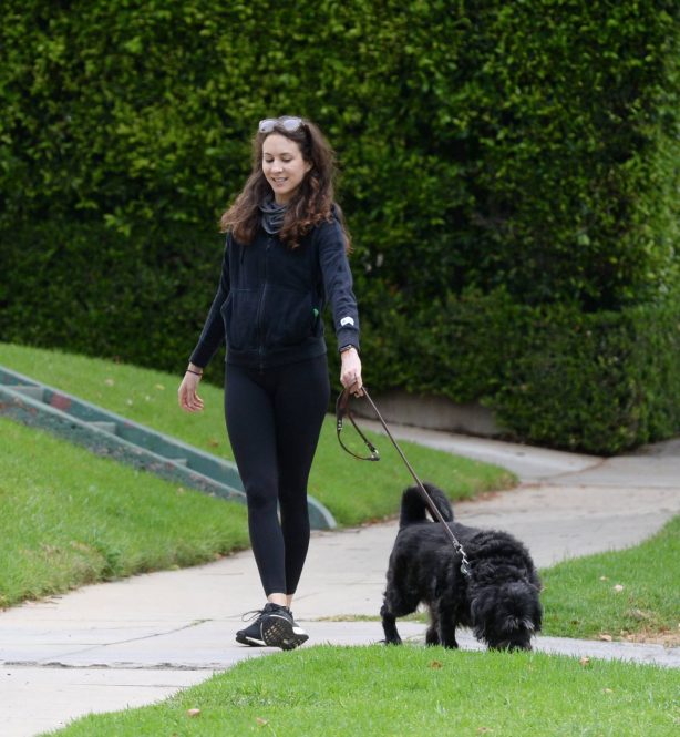 Troian Bellisario - Out for a walk with her dog in Los Angeles