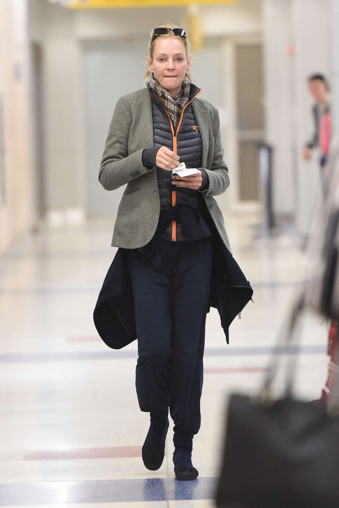 Uma Thurman - Arrives at JFK Airport in NYC