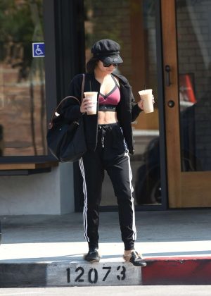 Vanessa Hudgens - Grabs two coffees after a workout in Los Angeles
