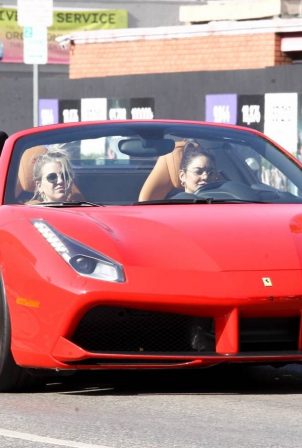 Vanessa Hudgens - Leaving Dogpound gym in her red Ferrari