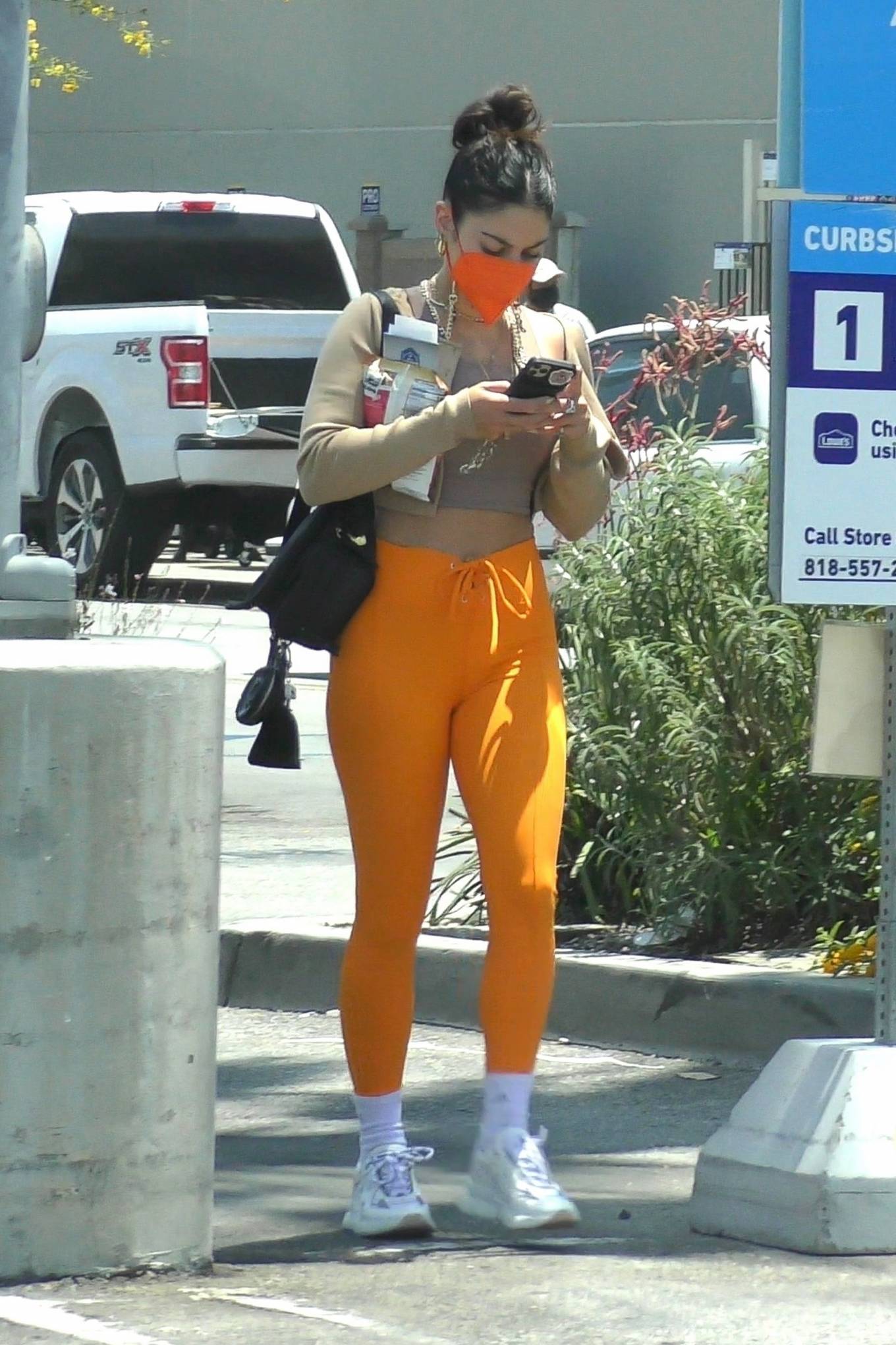 Vanessa Hudgens 2021 : Vanessa Hudgens – Out in orange pants and cropped tank in LA-02