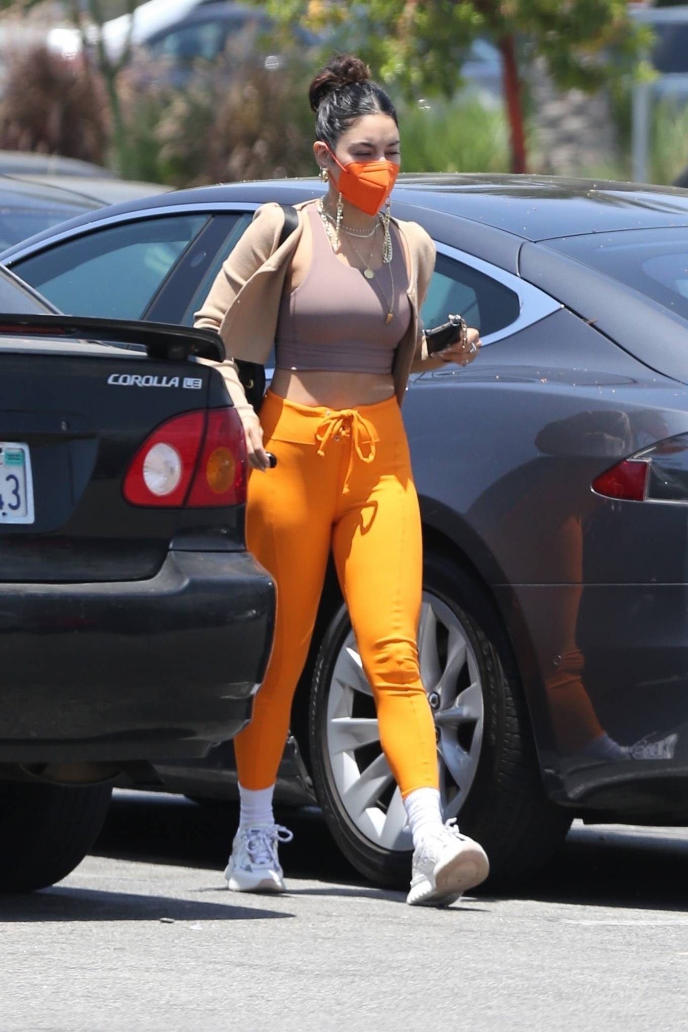 Vanessa Hudgens 2021 : Vanessa Hudgens – Out in orange pants and cropped tank in LA-04