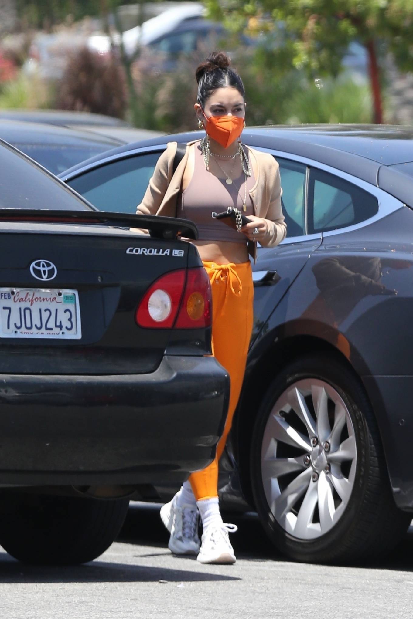 Vanessa Hudgens 2021 : Vanessa Hudgens – Out in orange pants and cropped tank in LA-09