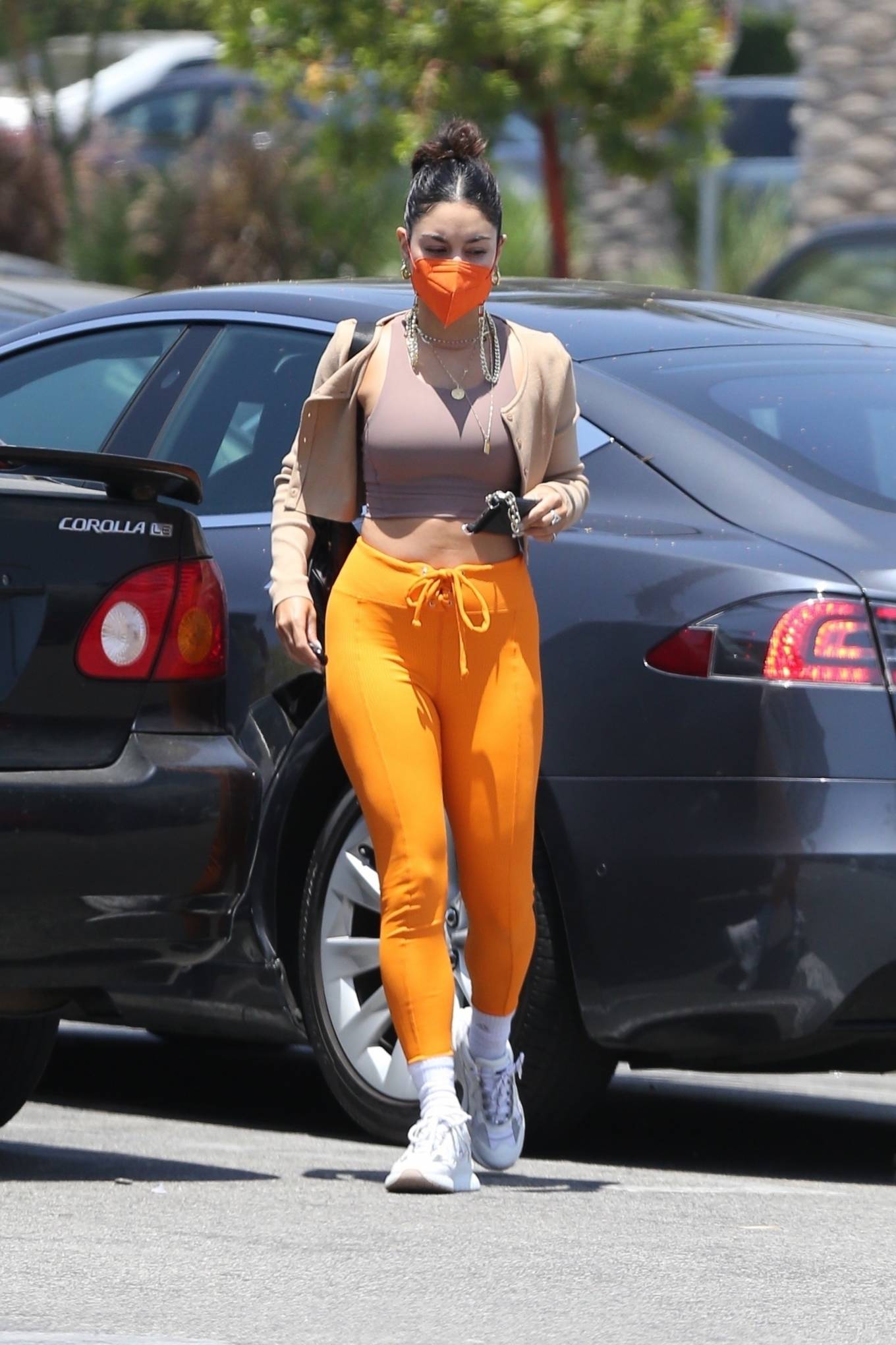 Vanessa Hudgens 2021 : Vanessa Hudgens – Out in orange pants and cropped tank in LA-13